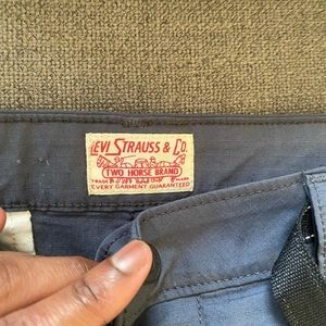Never worn Levi’s cargo taper pants. Very in-tune with newer fashion.